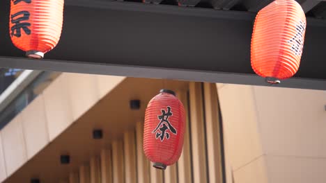 hanging chinese lanterns in the wind around the