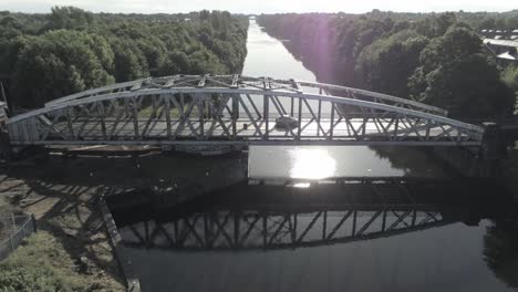 aerial view car crossing scenic old vintage steel archway traffic footbridge over manchester ship canal crossing