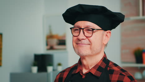 Elderly-age-man-wearing-chef-bonete