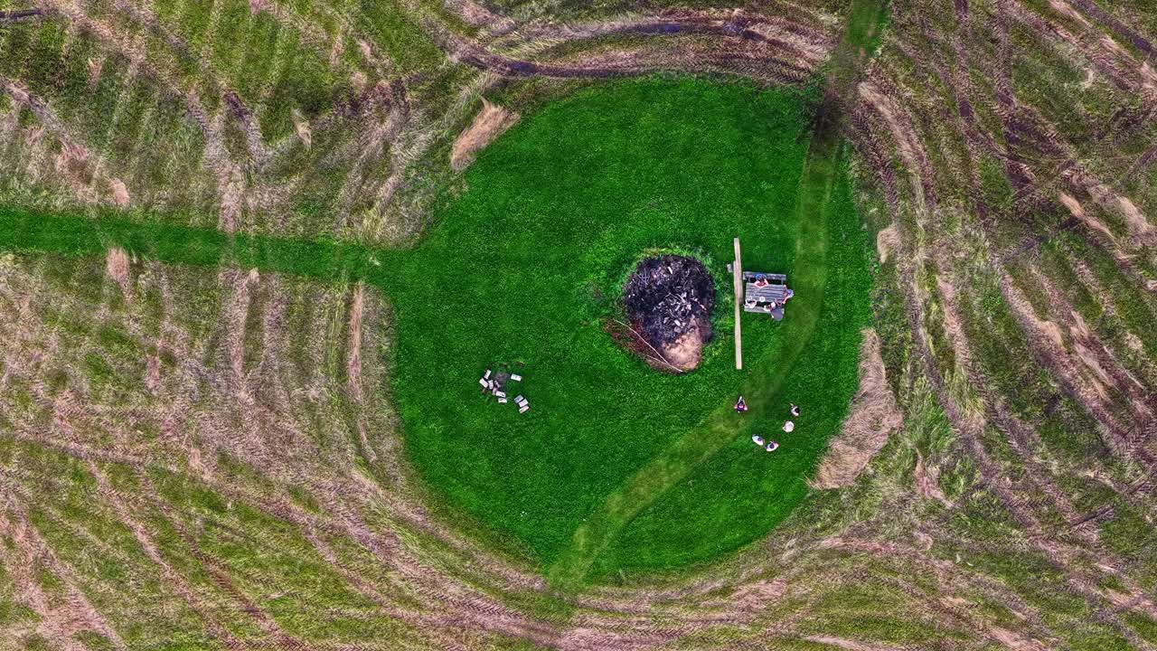 Group of people picnic outdoor eating BBQ barbeque food sharing bond, aerial top down view