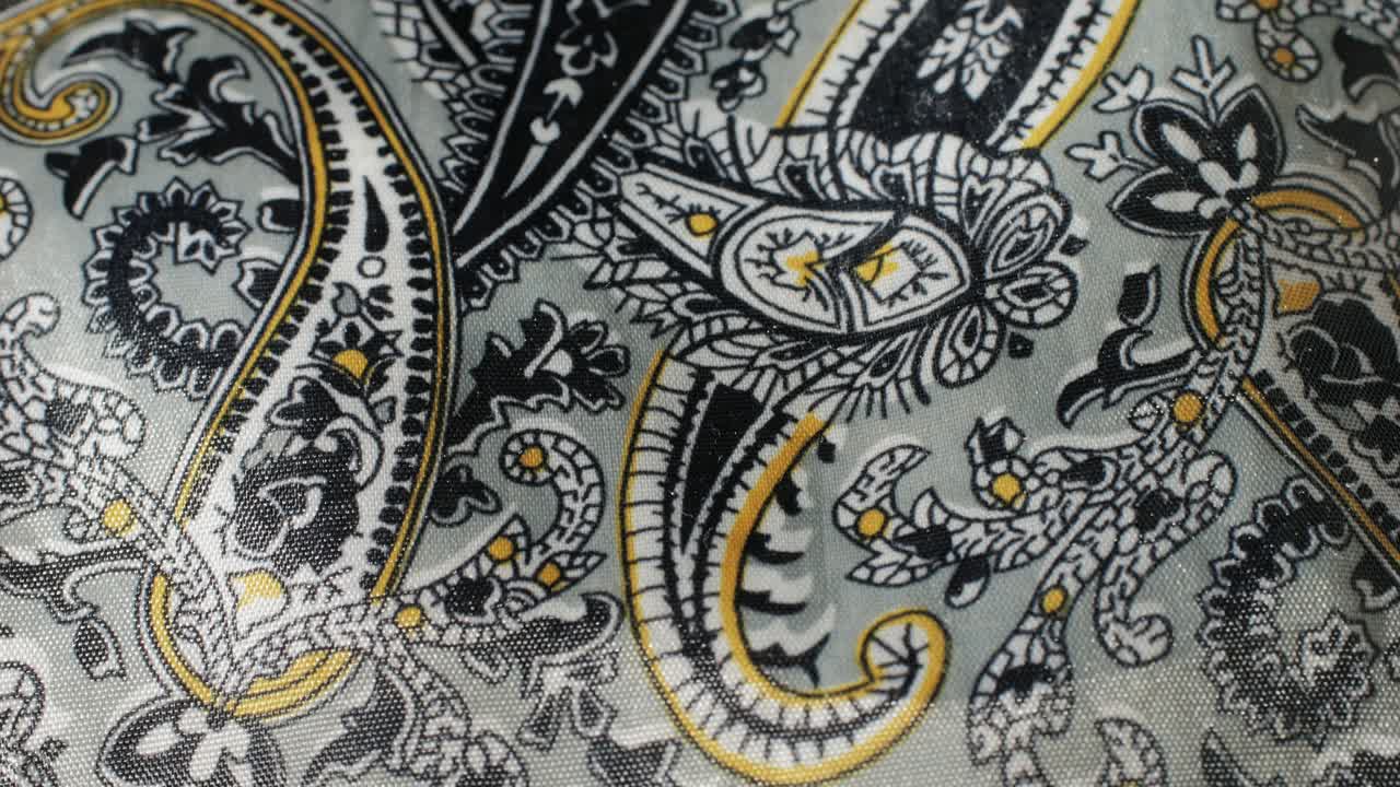 Colorful textile cloth texture close-up macro. Fashion fabric multicolor. High quality 4k footage