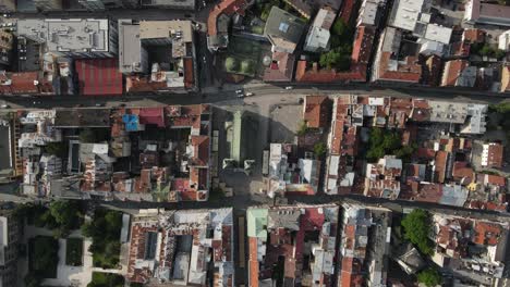 Drone-view-of-a-city-in-Bosnia-and-Herzegovina-in-the-Balkans,-aerial-roof-view-of-side-by-side-buildings