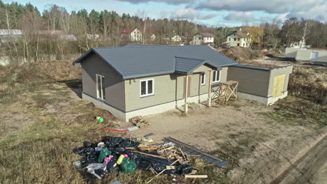 aerial view of a finished prefabricated house in a rural area