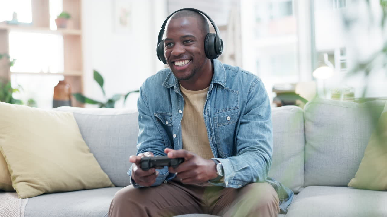 Man, headphones and video game with controller