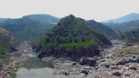 a curve in mountains with river