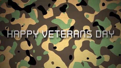 video generado digitalmente del texto feliz del día de los veteranos contra un fondo de camuflaje