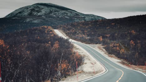 drive on the narrow two-lane road through the windswept northern landscape