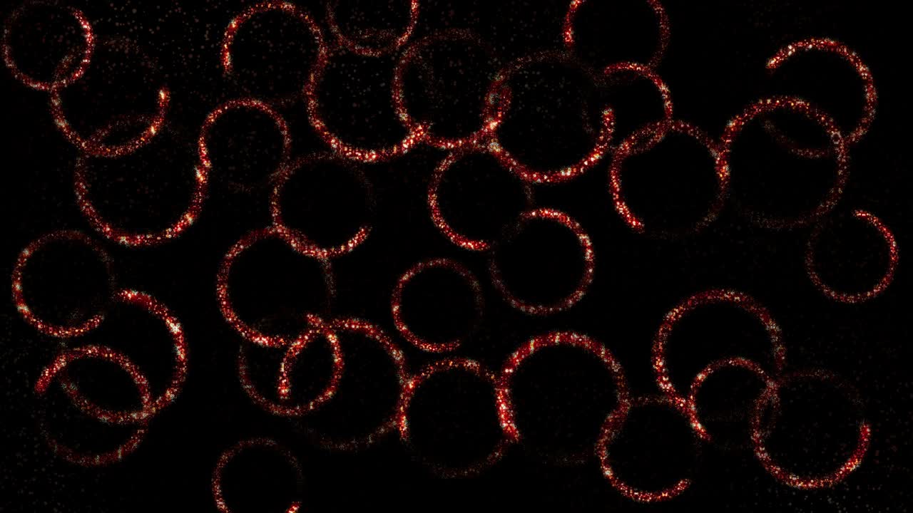 Beautiful kars shimmering fire circles. Abstraction. Christmas background. They rotate and shine on a black background.