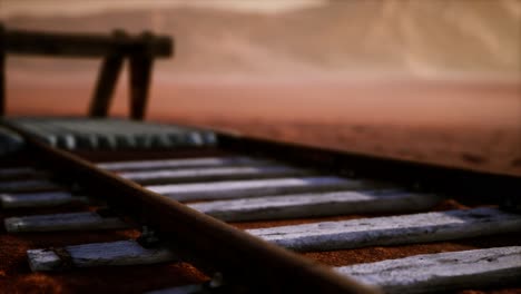 abandoned railway tracks in the desert