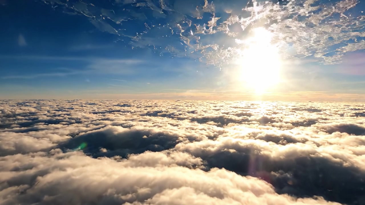 Una vista mozzafiato di nuvole infinite immerse nella luce dorata del sole, che mostra la bellezza della natura vista dall'alto, ispirando meraviglia e tranquillità a chiunque la osservi