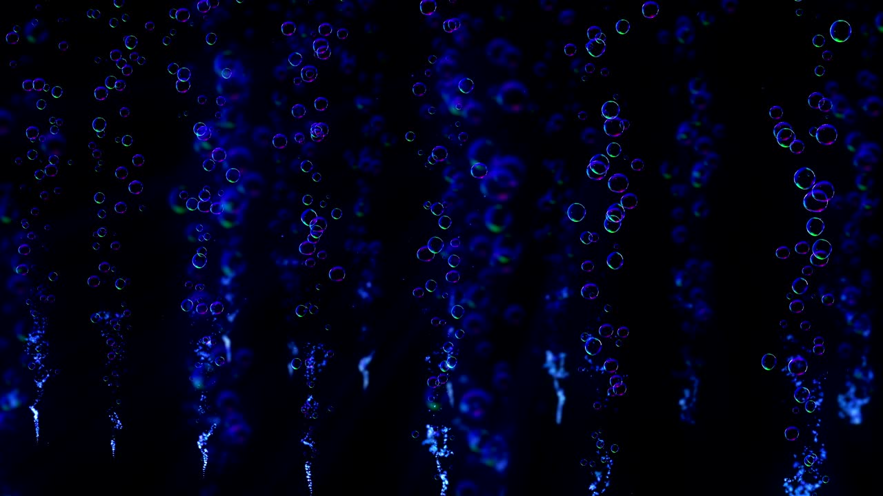 burbujas de arco iris en un fondo oscuro, bucle,