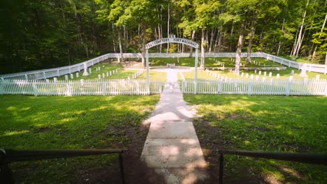 wide shot of post cemetery,the final resting place for fort mackinac soldiers, their families and local officials