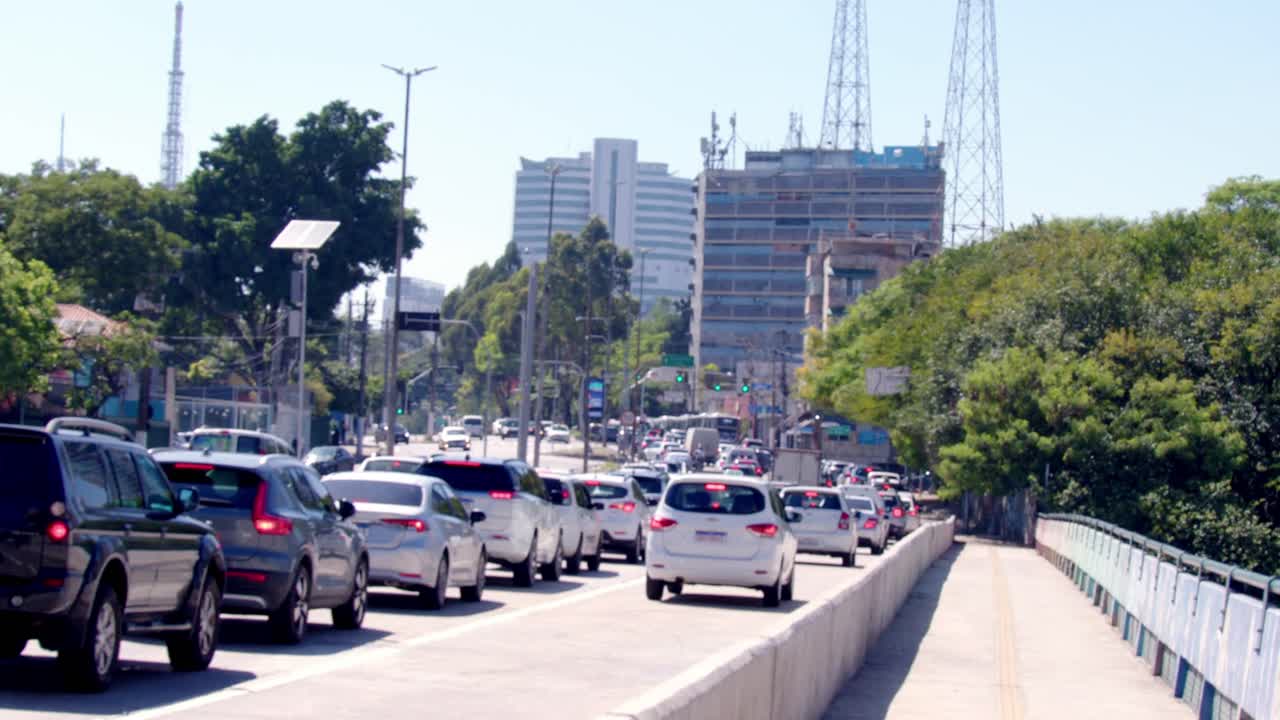 Busy highway traffic lights, stop, go safety journeys, city travel
