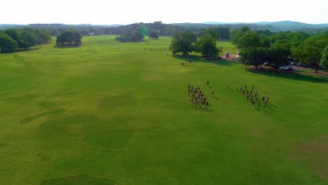 People-playing-soccer-in-Zikler-Park-in-Austin,-Texas