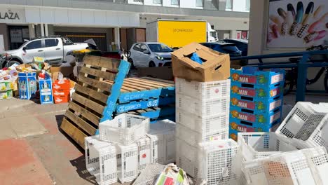 discarded boxes and pallets at fruit market