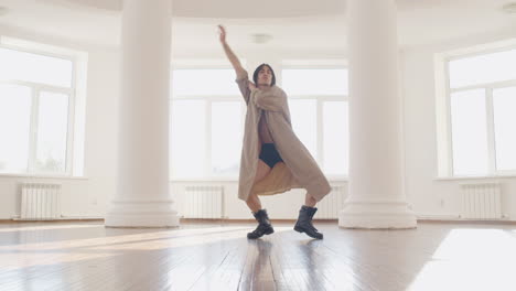 contemporary male japanese dancer training dance moves in the middle of the studio 2