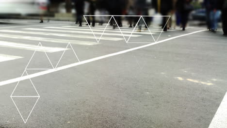 Animation of connected triangles over time-lapse of people walking on street