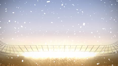 Animation-of-confetti-floating-over-stadium-at-sunset