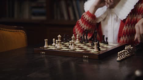 woman playing chess