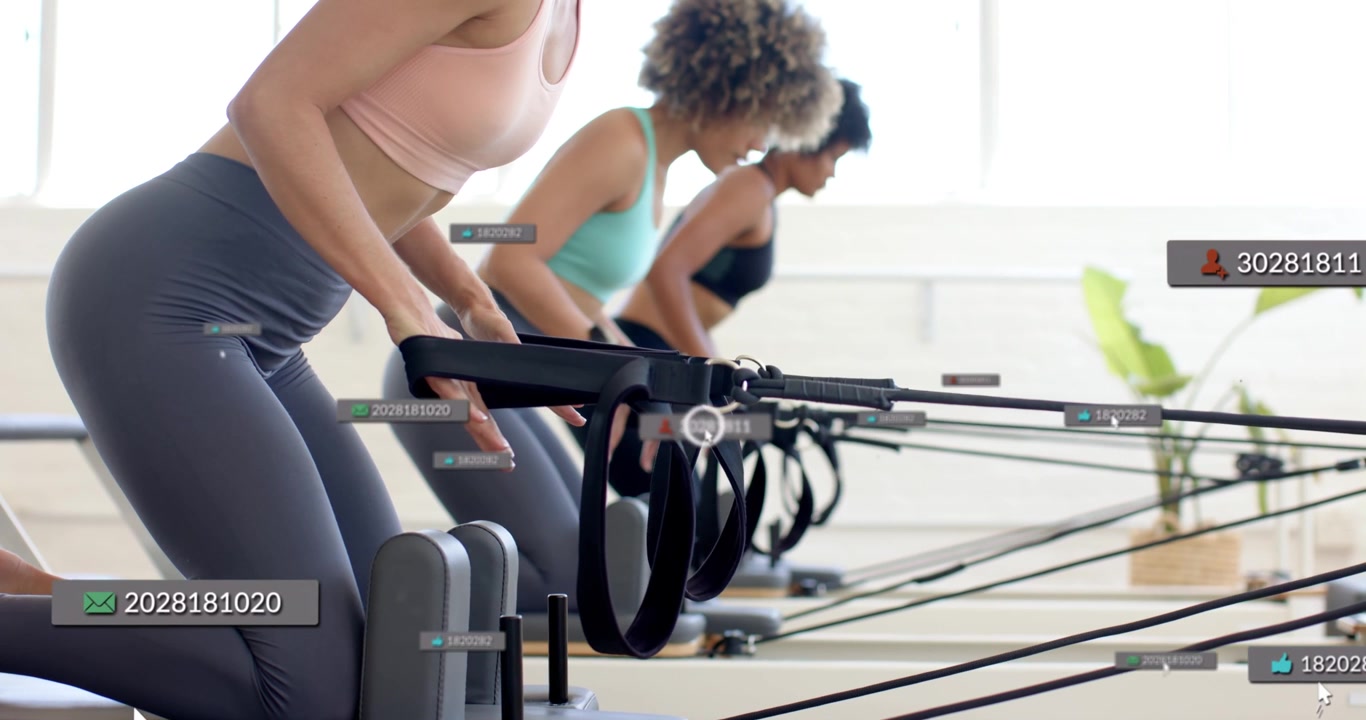 Front woman kneeling on reformer pulling straps after start cue to tone core while overlays rising