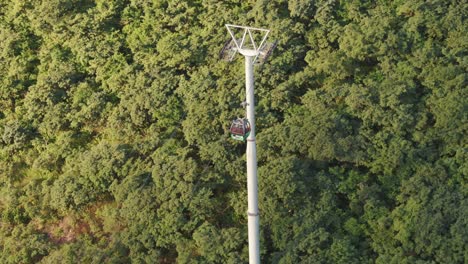 Aerial-Tracking-Shot-Of-Gondola-Descending-Mountain-To-Salta,-Capital-City-Of-Argentina