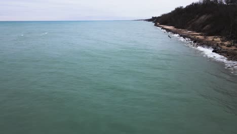 Rotating-around-abandoned-cars-at-the-bottom-of-the-bluffs-in-Saint-Joe