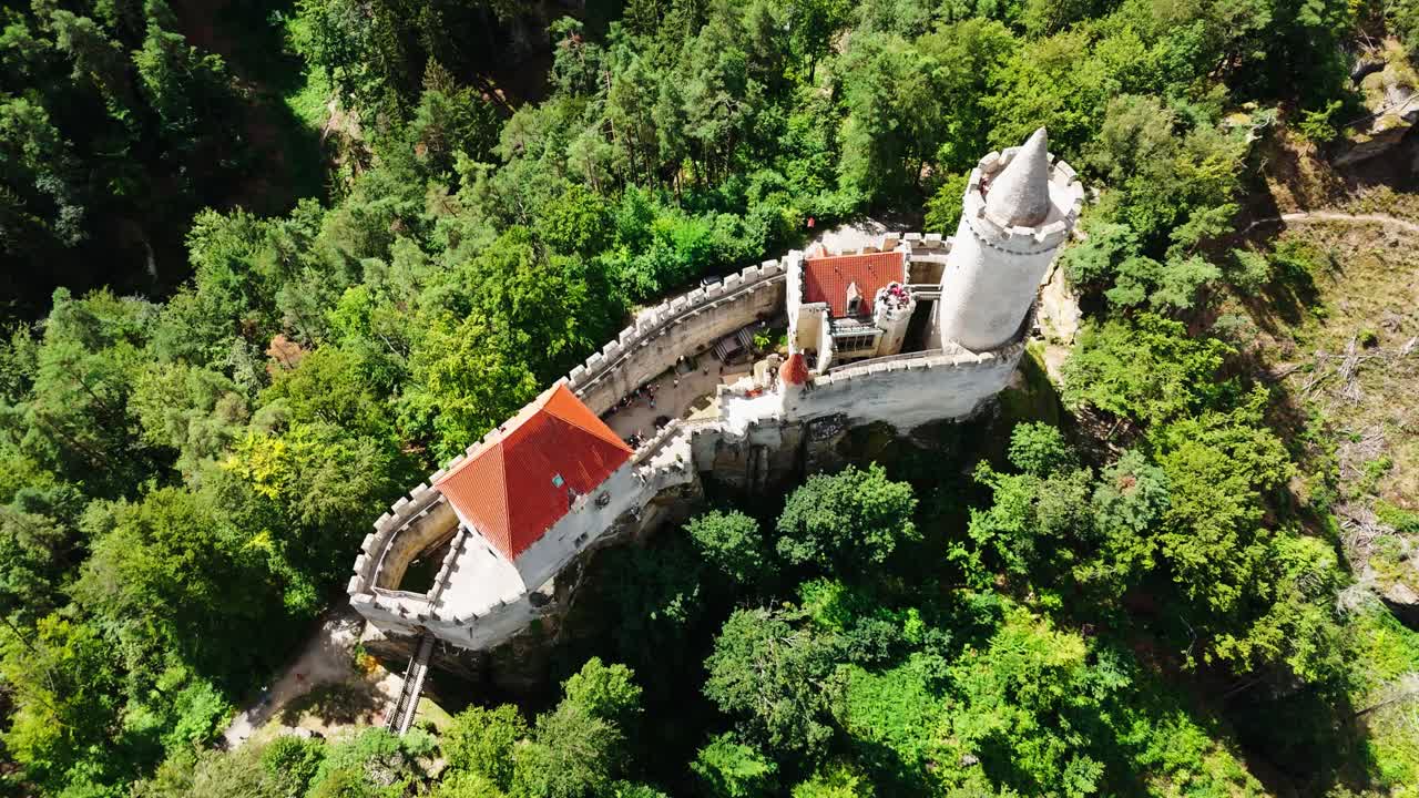 Flying over scenic medieval Kokorin castle, central Bohemian region, Czechia