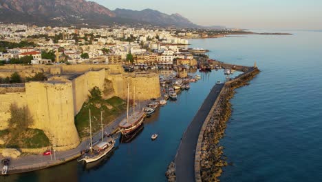 aerial pan of girne castle kyrenia while a