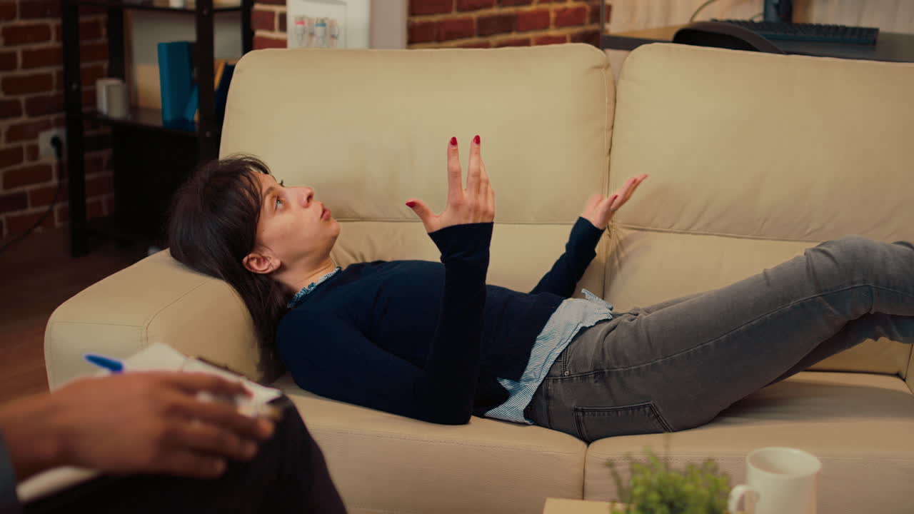 Unhappy woman talking to therapist about marriage problems