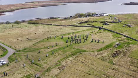 tilting drone shot of the callanish standing stones on the isle of lewis, part of the outer hebrides of scotland