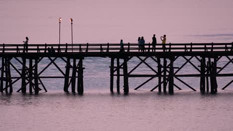 The-Mon-Bridge-is-an-old-wooden-bridge-located-in-Sangkla,-Thailand