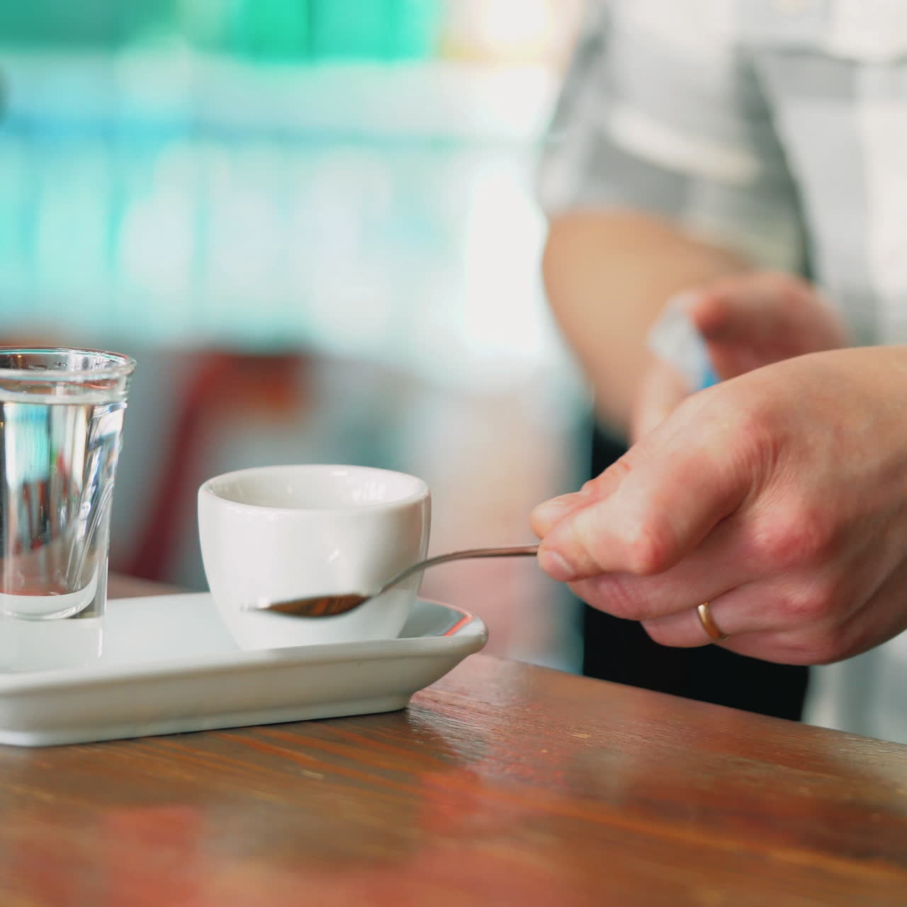 Black coffee served in white cup. Sqare video