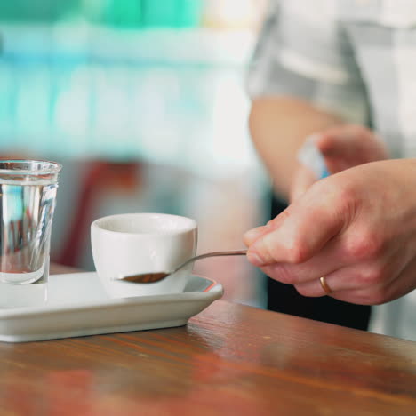 black coffee served in white cup. sqare video