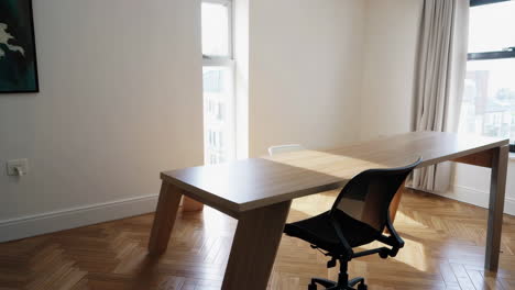 modern office space with wooden desk and mesh chair
