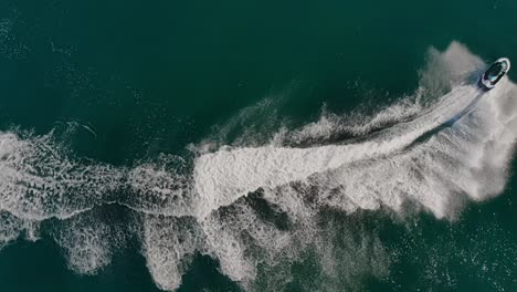 Drone-shot-of-a-jetski-in-Marbella,-Spain