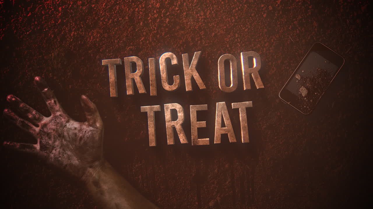 truco o trato con sangre roja y teléfono móvil con las manos