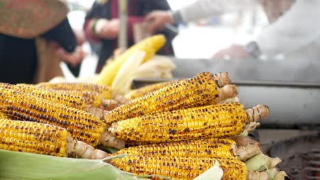 grilled corn at a street food stall