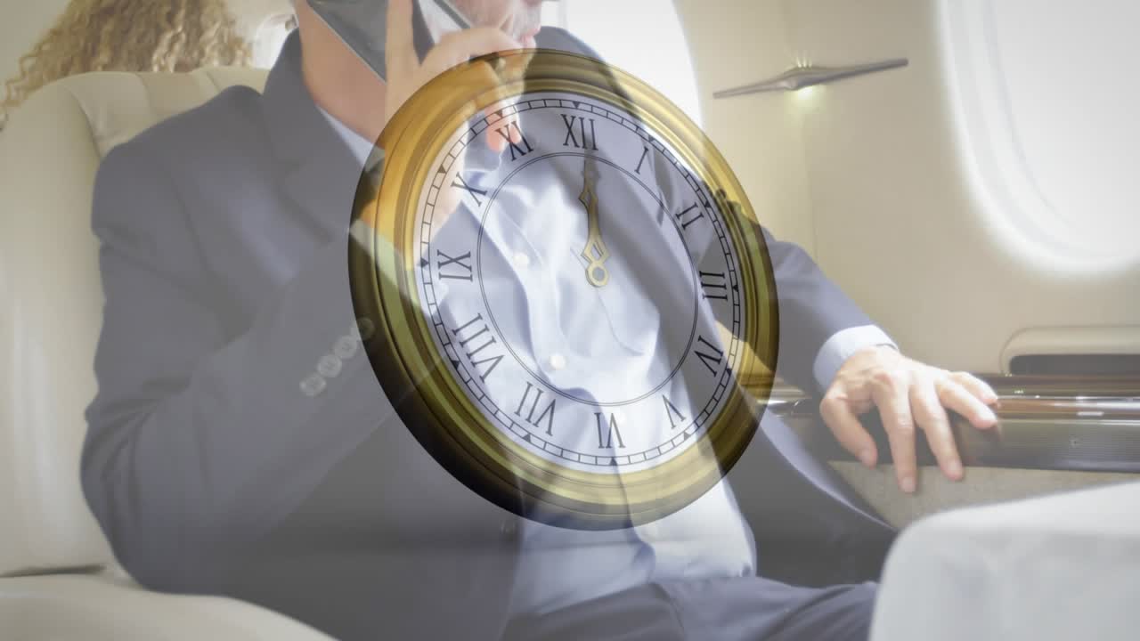Businessman retrieving smartphone and calling in airline seat with clock overlay advancing