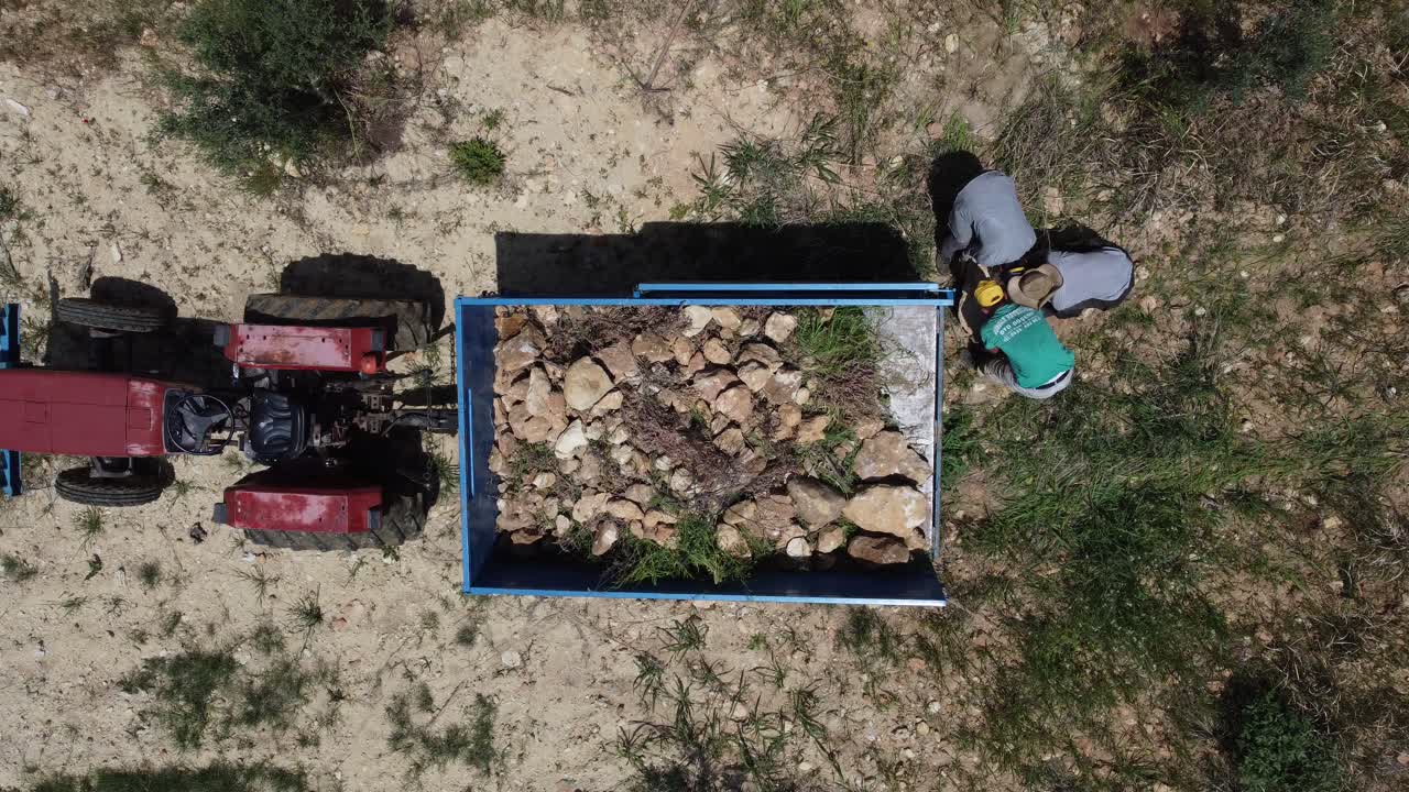 tractor de carga de piedras para trabajadores