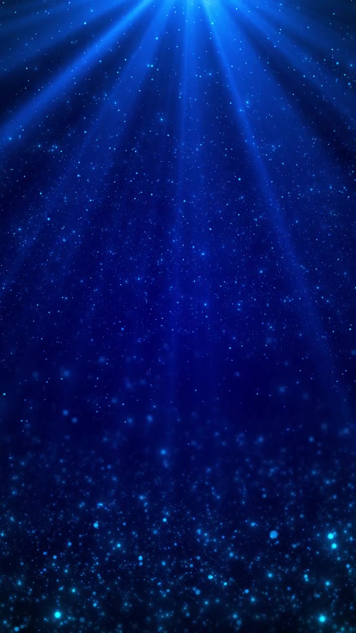 Deep blue star particle scene glowing beams floating dust soft bokeh cinematic atmosphere concert