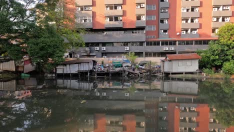 static view of a building reflecting on water