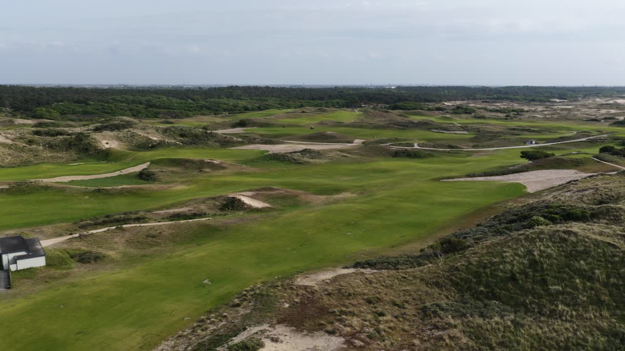 Golf club at Noordwijk, dunes, sports and recreation. Aerial drone video.
