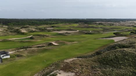 golf club at noordwijk, dunes, sports and recreation. aerial drone video.