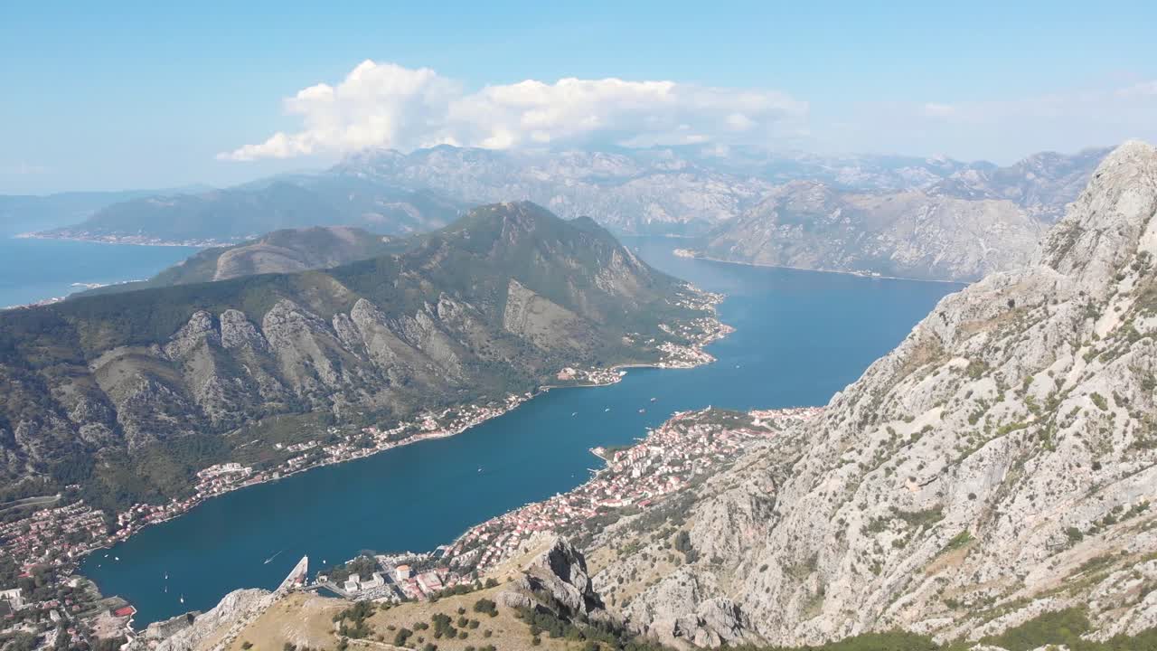 Beautiful Kotor Bay in Montenegro during a sunset in the Balkans. Aerial view above kotor bay with the whole adriatic ocean in the background the best view of Kotor bay