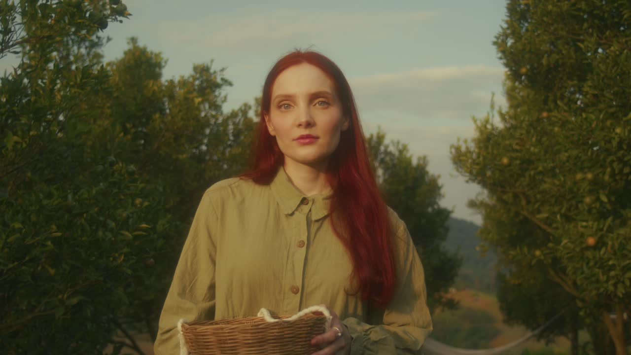 Woman in an Orchard at Golden Hour
