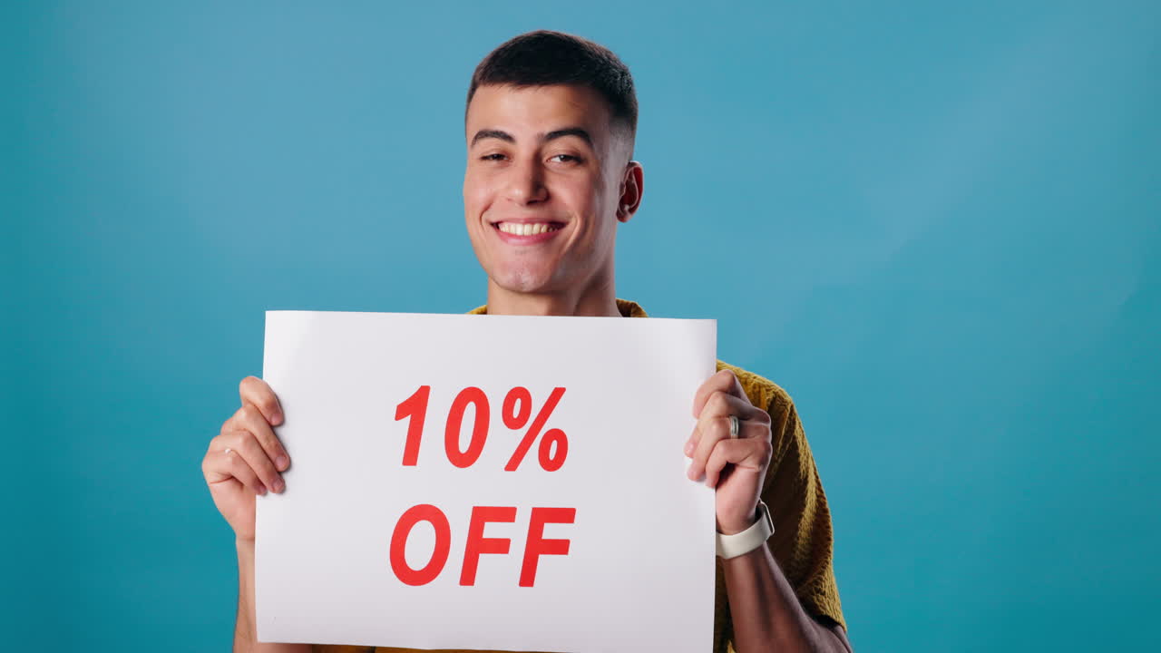 Man holding a 10% off sign