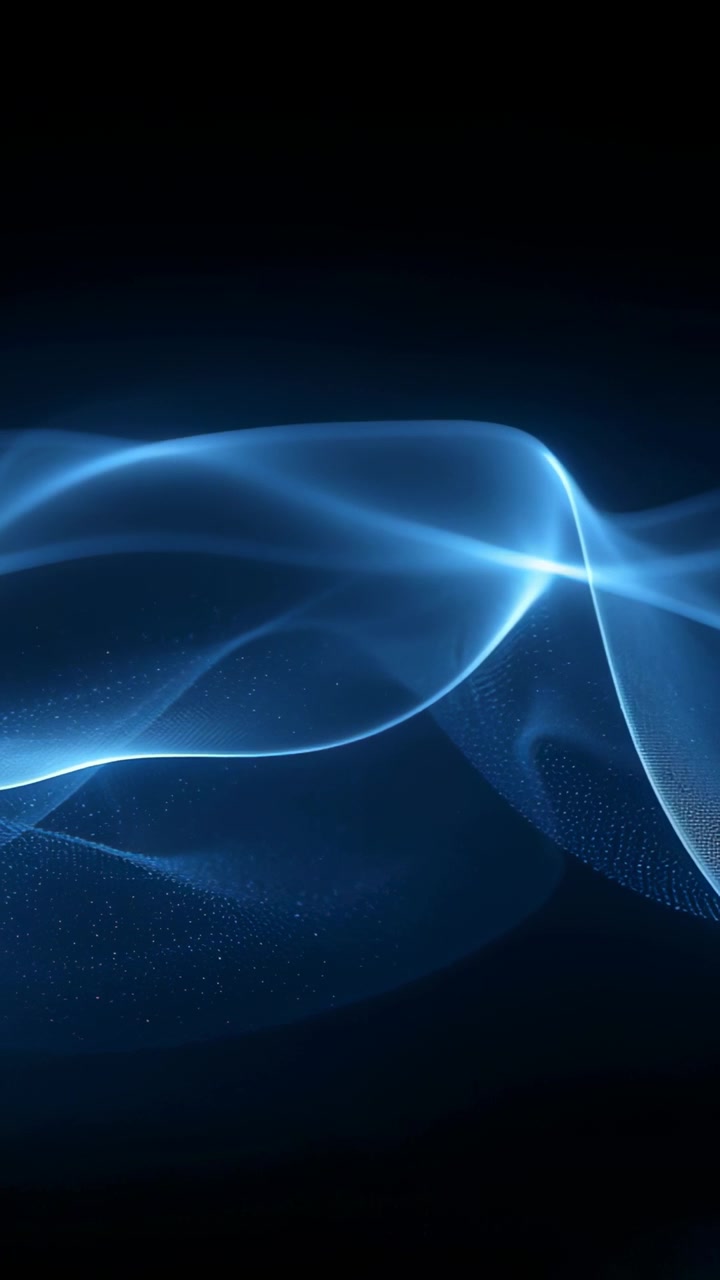 Vertical video: Animating blue ribbon flowing on black backdrop, showing bright crest and particles