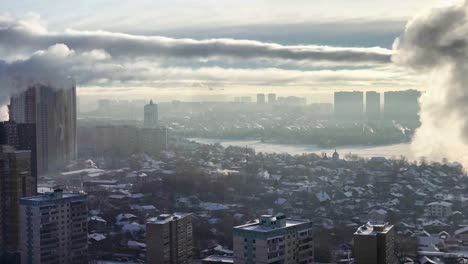 aerial time lapse of fast changing cloudscape over city in winter