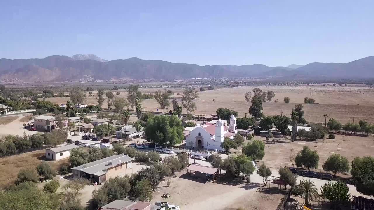 Drone flying to a wedding on a church
