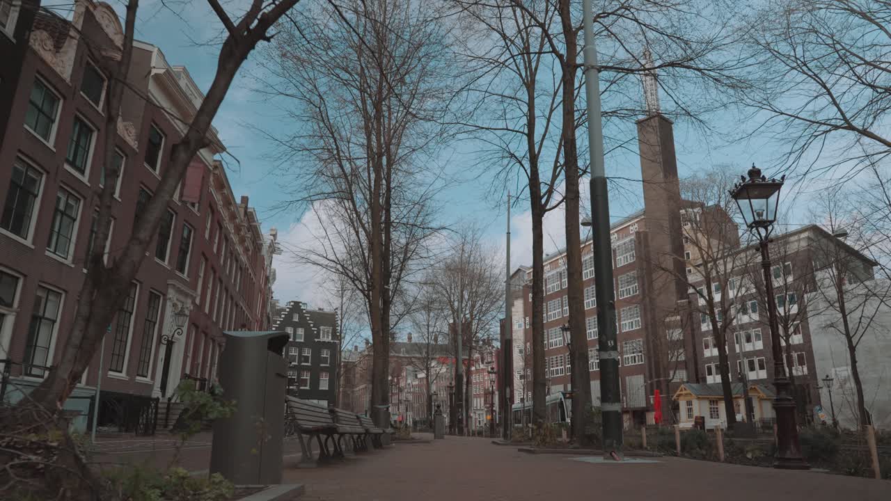 Street view in Amsterdam with buildings and trees